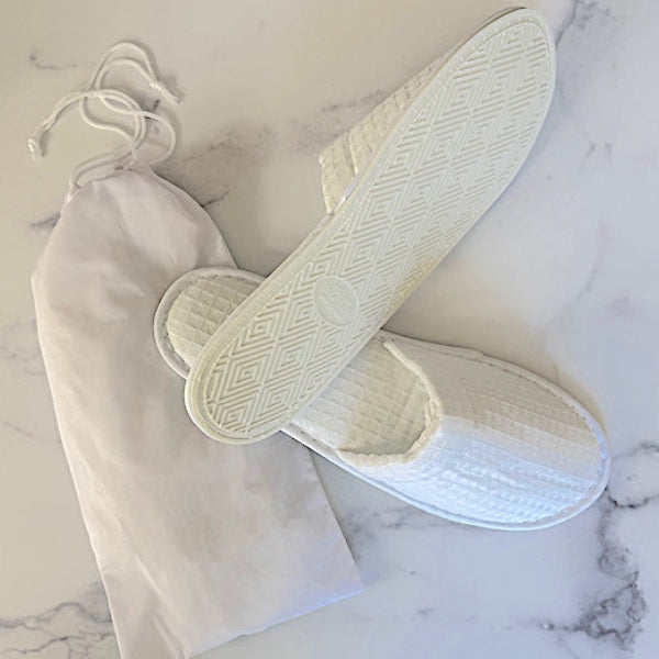 Luxury Waffle Weave Disposable Hotel Slippers with No-Skid PVC Soles with Drawstring Dust Cover Bag| GuestOutfitters.com 