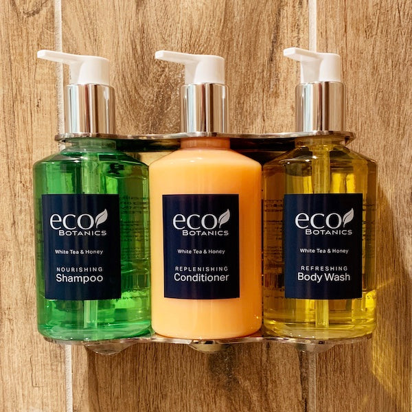 Eco Botanics White Tea and Honey Bath Toiletries, 10.14oz Pump Bottles in EcoLux Chrome Dispenser Bracket | GuestOutfitters.com