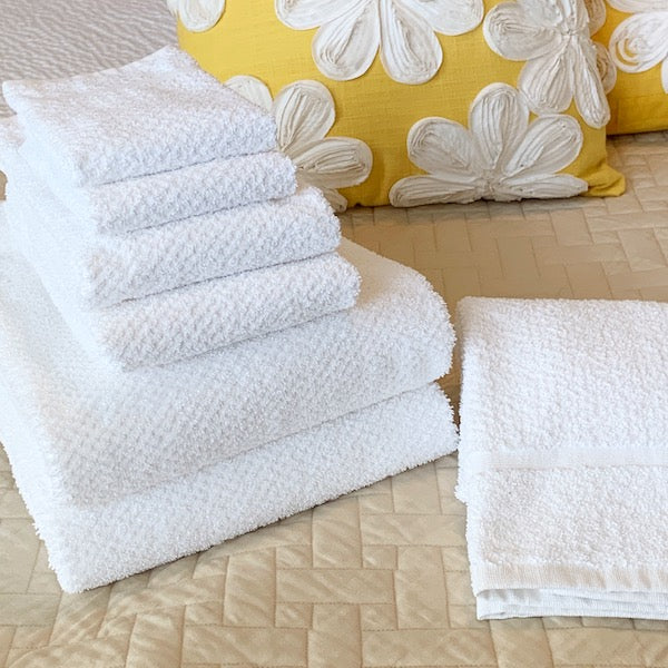 Hospitality grade Pique Weave bath linen sets from Standard Textile add textured elegance to vacation rental baths | GuestOutfitters.com