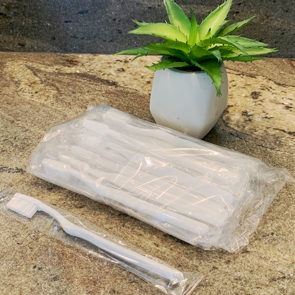 Individually Wrapped Hotel Toothbrushes for Vacation Rental Amenity Supplies | GuestOutfitters.com